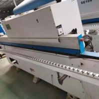 专业出售九成新封边机冷压机双面刨精密锯